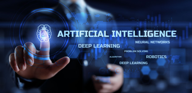 A person in a suit holds a glowing, holographic display with the words 'Artificial Intelligence' and related icons, symbolizing technology and innovation.