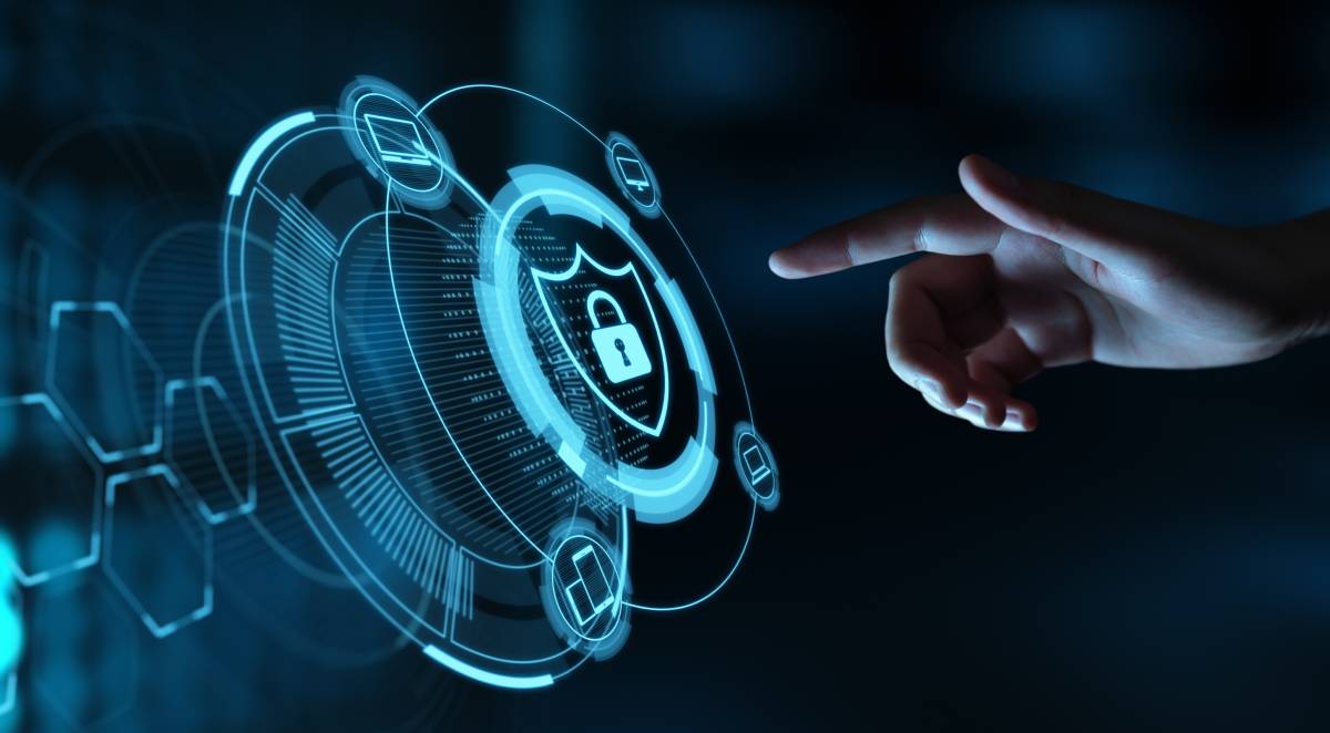 A hand pointing at a digital blue lock