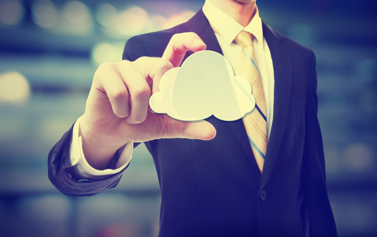 Businessman Holding Cloud