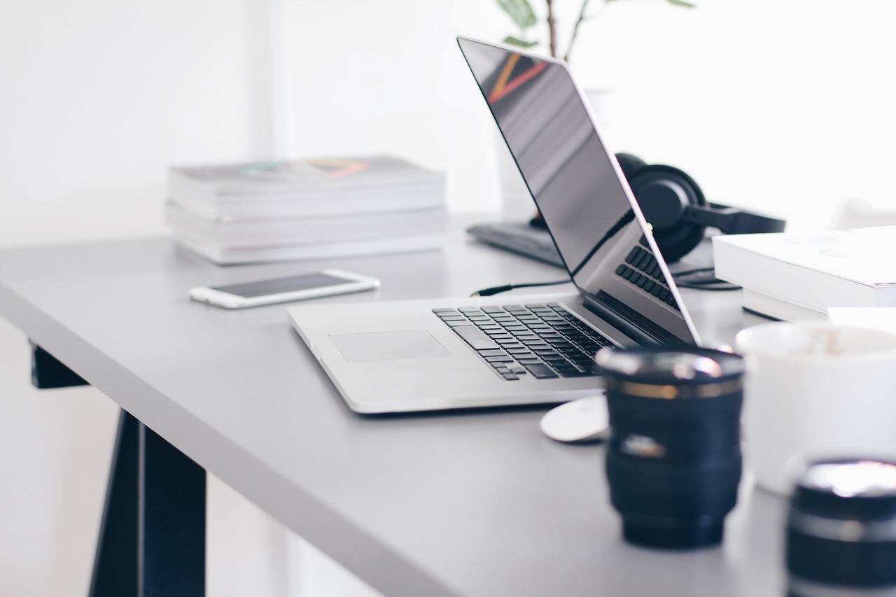 Sleek, slim laptop on a gray business desk