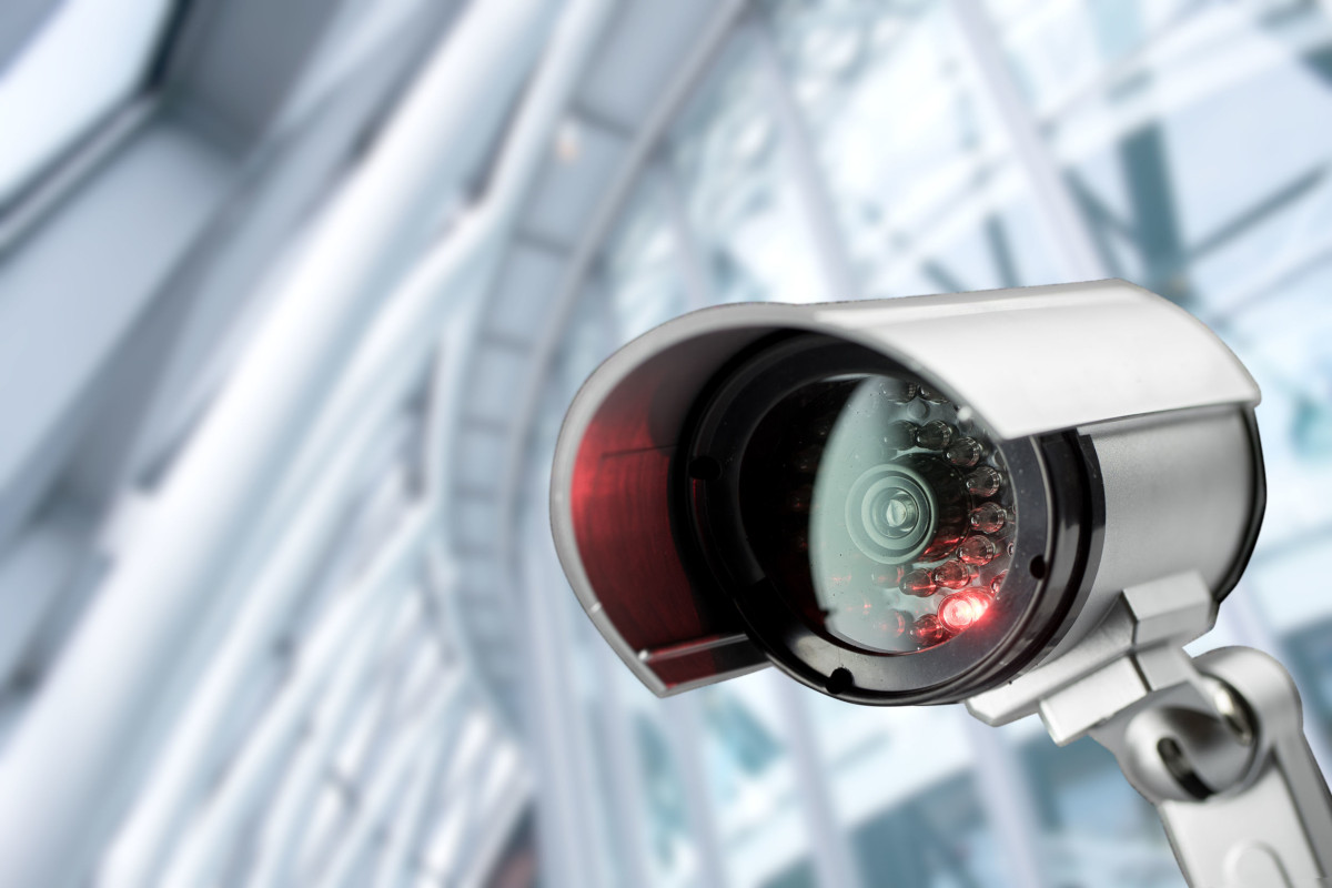 A cylindrical modern security camera.