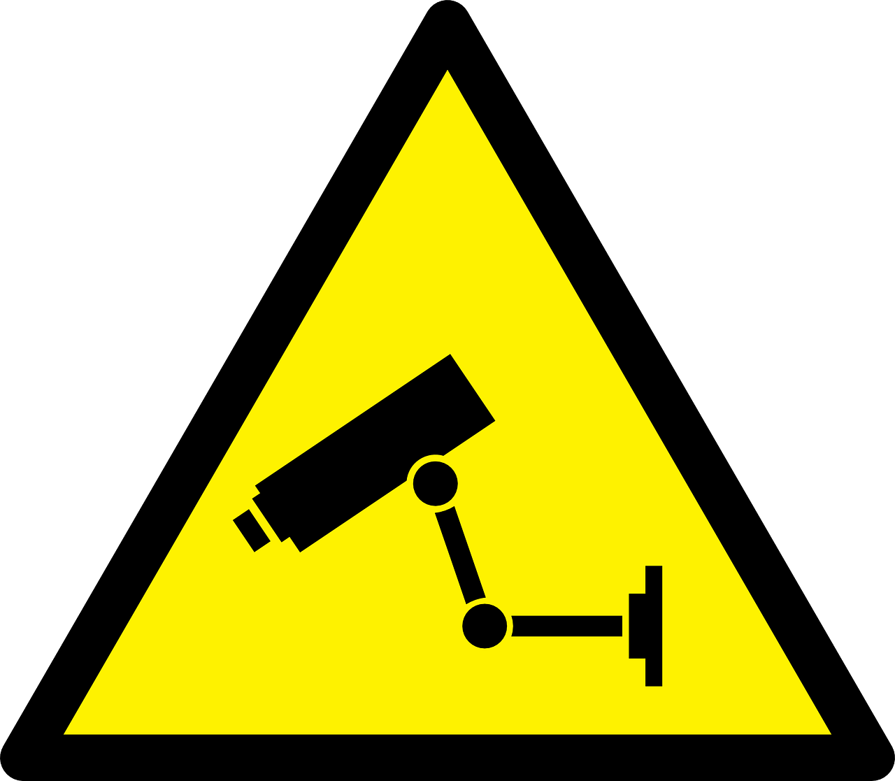 Triangular sign with silhouette of a security camera on a field of yellow