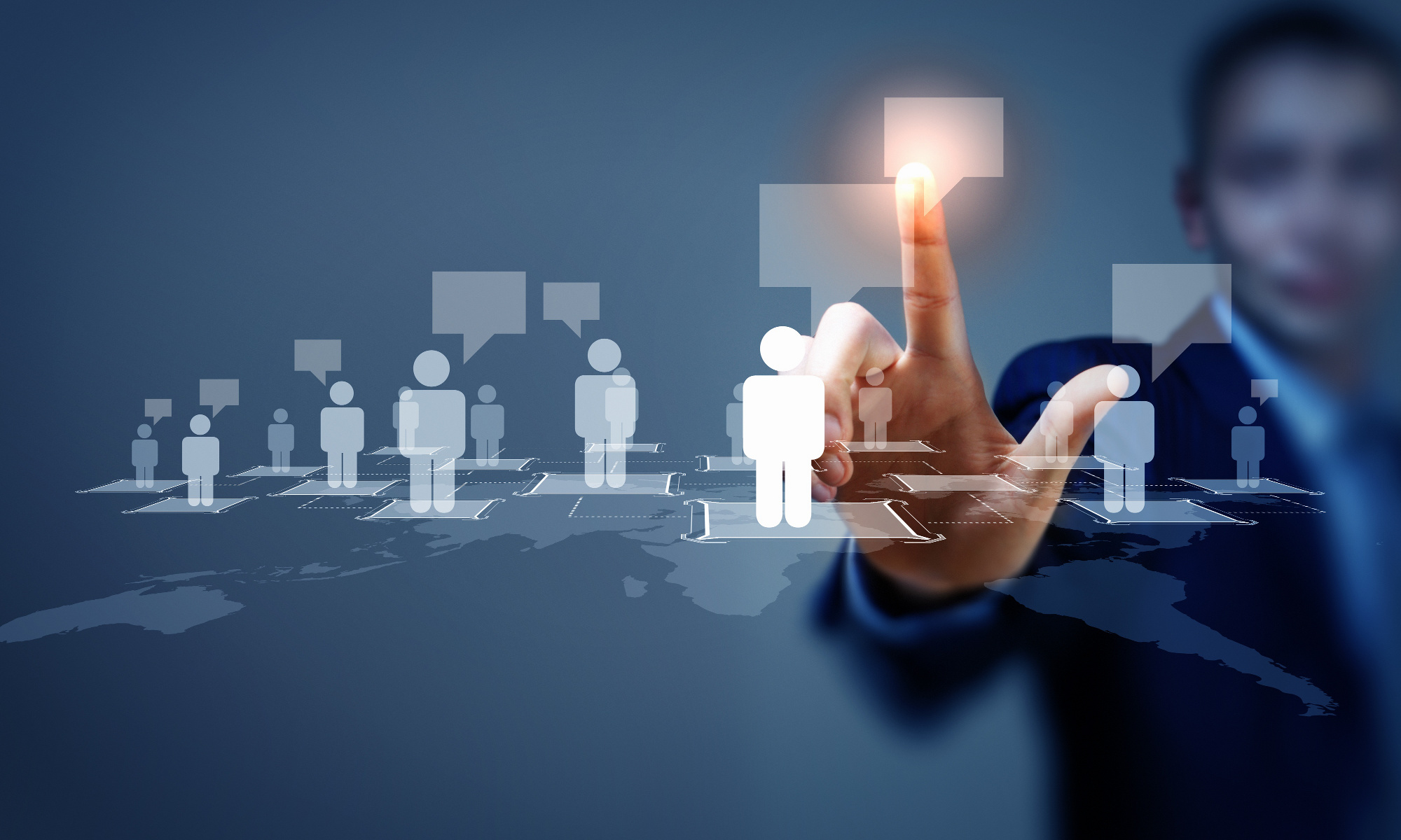 A man reaching out an touching and overlay of icons representing people sending messages