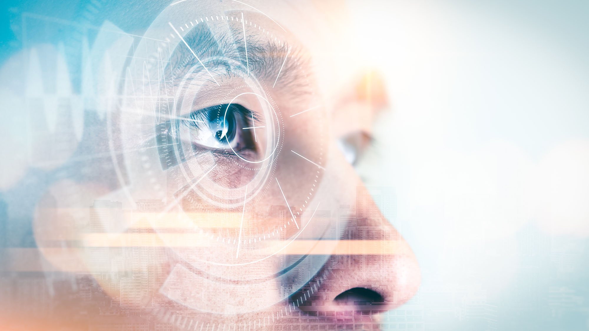 Close up of a mans eye, with a graphic interlaced overtop of it to represent advanced security technology
