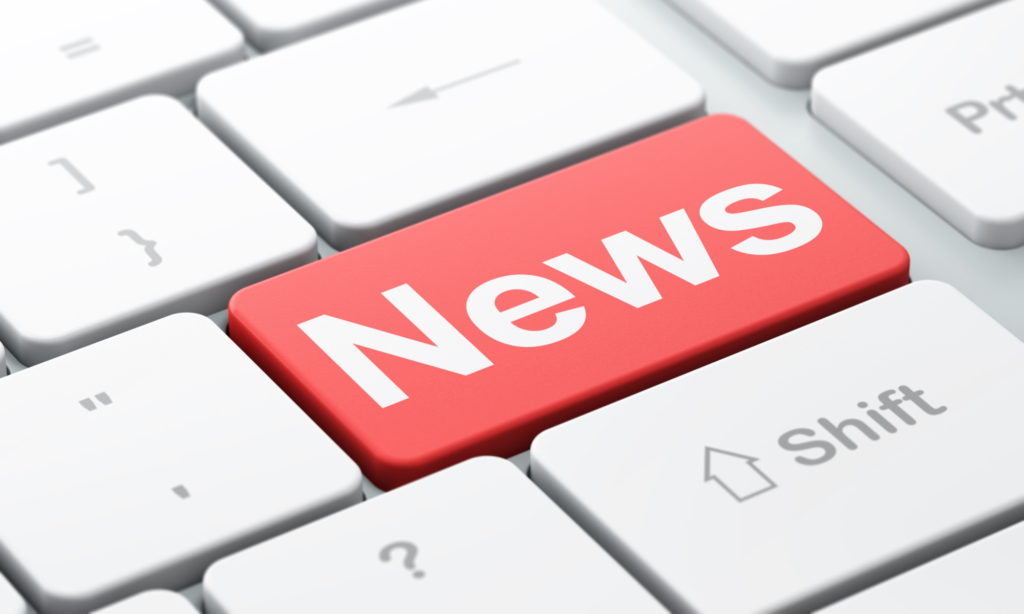 Computer keyboard with NEWS key selected, representing press releases and news updates